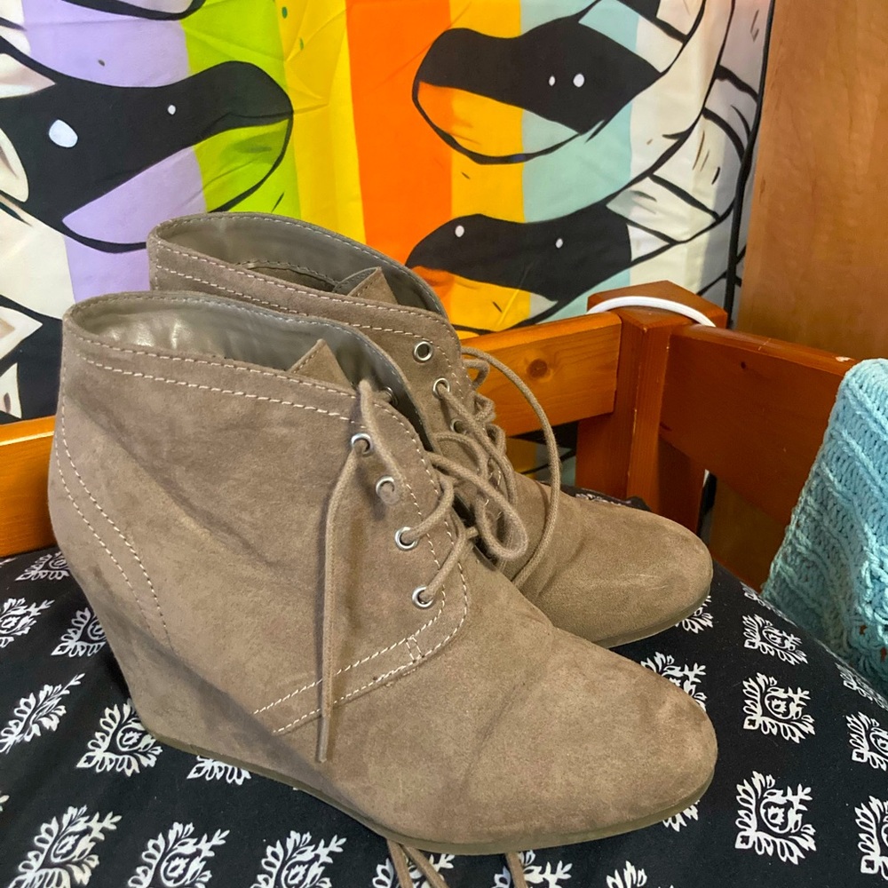 Little tan booties! I’m pretty sure they are from JCPenney or target originally